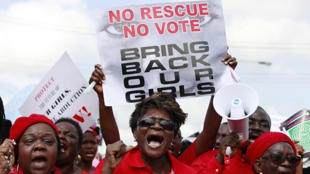 Women attend a demonstration calling on the government to rescue the kidnapped Chibok school in Lagos, Nigeria, in  2014.  