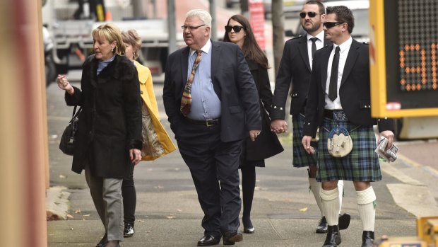 Paul Rossington's brothers wear the family tartan as a tribute to their brother while accompanying their parents and sister to court. 