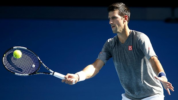 Novak Djokovic of Serbia plays a shot during a practice session, ahead of the Australian Open.