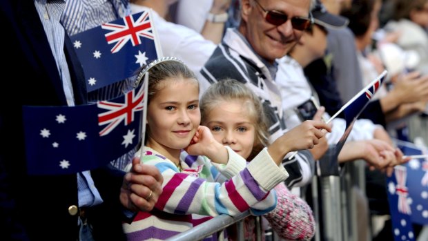 People watch the Anzac Day march along George Street, Sydney in 2009. 