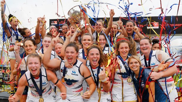 Crows players celebrate during the AFL Women's Grand Final between the Brisbane Lions and the Adelaide Crows on March 25, 2017 in Gold Coast, Australia. (Photo by Jason O'Brien/Getty Images)