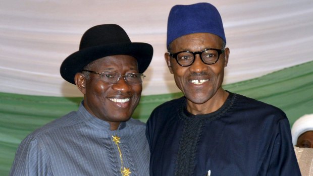 Nigeria's main presidential candidates, President Goodluck Jonathan (left) and Muhammadu Buhari, sign a peace accord in Abuja on Friday to promote peace on Saturday's election.