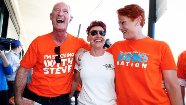 One Nation Queensland leader Steve Dickson and Senator Pauline Hanson meet voters at a polling booth in Buderim on Friday. Dickson is considered unlikely to win a seat.