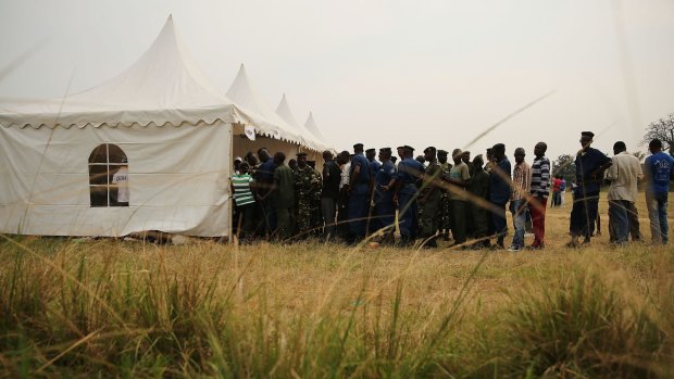 Burundian police and soldiers vote at a polling station this week.