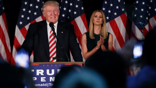 Ivanka Trump listens as her father delivers a policy speech. 
