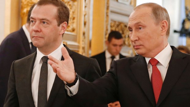 Russian President Vladimir Putin, right, and Prime Minister Dmitry Medvedev.