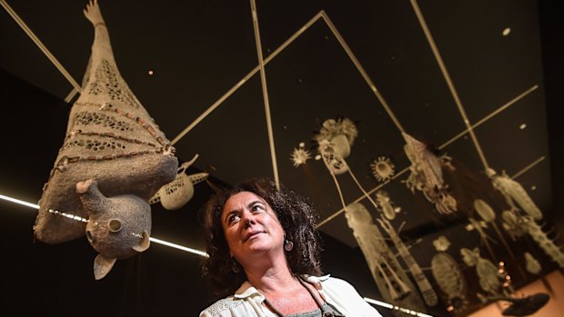 Bellbrae artist Jenny Crompton with her woven installation <i>Sea Country Spirits</i> at the Ian Potter Centre: NGV Australia as part of <i>Who's Afraid of Colour?</i>,.