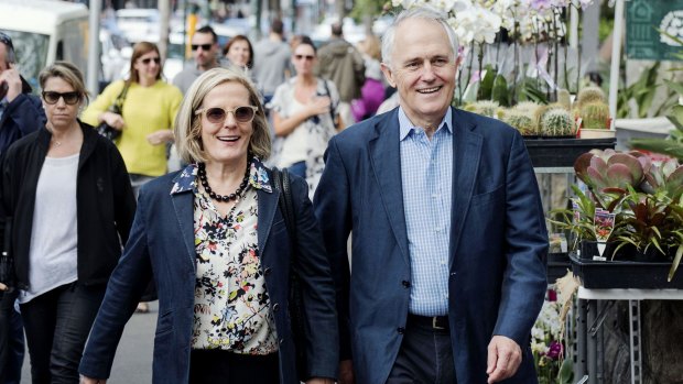 Power walkers: Lucy and Malcolm Turnbull stroll through Paddington last month.