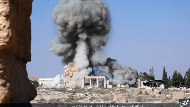 Smoke billows from the detonation of the 2000-year-old temple of Baalshamin in Syria's ancient caravan city of Palmyra, as seen in this image published last month on a social media site used by Islamic State militants. 