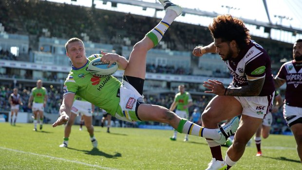 Worlds collide: Jorge Taufua's bump on Jack Wighton was deemed a shoulder charge. 