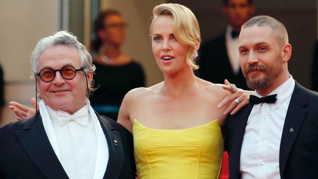 George Miller, Charlize Theron and Tom Hardy at Fury Road's premiere at the 68th Cannes Film Festival in 2015. 