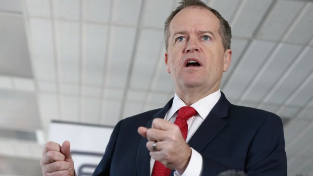 Opposition Leader Bill Shorten Mr Shorten has accused Mr Abbott of selling out "Aussie jobs".