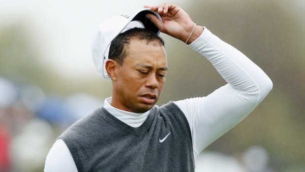 Return delayed: Tiger Woods.