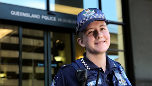 Transgender police officer Mairead Devlin, 22, said he was "humbled" to raise the flag and had been overwhelmed by the support within QPS for his gender transition.