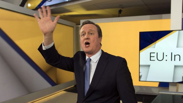 British Prime Minister David Cameron waves after his Sky News interview with Faisal Islam.