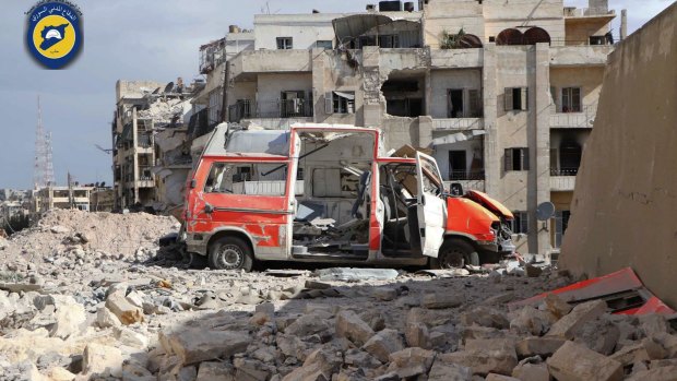 A destroyed ambulance is seen outside the Syrian Civil Defence main centre after airstrikes in eastern Aleppo.
