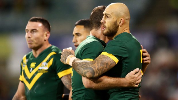 CANBERRA, AUSTRALIA - MAY 05: Blake Ferguson of Australia celebrates with team mates after scoring an intercept try during the ANZAC Test match between the Australian Kangaroos and the New Zealand Kiwis at GIO Stadium on May 5, 2017 in Canberra, Australia. (Photo by Mark Nolan/Getty Images)