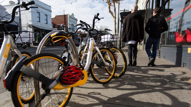 oBikes seen on Swan Street in Richmond, which is now home to "hundreds" of the distinctive bikes, according to locals.