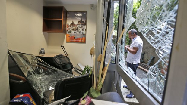 The Thai consulate in Istanbul on Thursday, damaged by a group of protesters who stormed the building, smashing windows and breaking into offices, where they destroyed pictures and furniture and hurled files out into the yard.