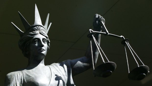 A former council officer has been charged over a $500,000 payment.