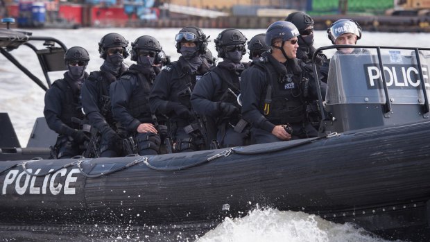 Armed Metropolitan Police counter terrorism officers take part in an exercise on the River Thames. 
