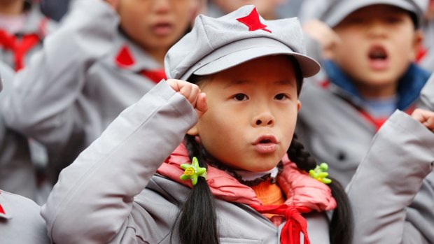 Young Chinese students dressed in Red Army costumes at a school ceremony in Gulin county, Luzho, Sichuan province.