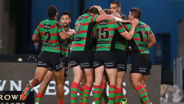 Much-needed win: South Sydney Rabbitohs players celebrate Aaron Gray's first try.