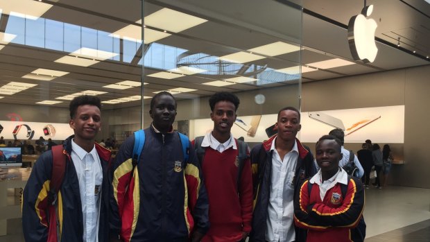 Students Petrie Alemu, Mabior Ater, Mihamed Semra, Ese Oseghale and Gereng Dere go to Apple at Highpoint Shopping Centre for the store's apology.