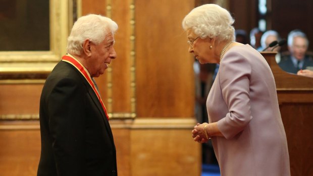Sir Frank Lowy AC, during his investiture by the Queen at Windsor Castle last week.