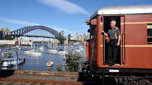 The red rattler rolled over the Harbour Bridge on Wednesday to mark the 90th anniversary of Sydney's first electric trains.