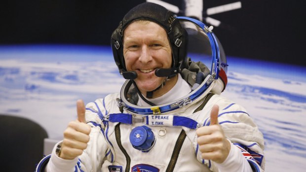 British astronaut Tim Peake, a member of the main crew of the expedition to the International Space Station, gives the thumbs-up prior to the launch of Soyuz TMA-19M space ship at the Russian-leased Baikonur cosmodrome, Kazakhstan.