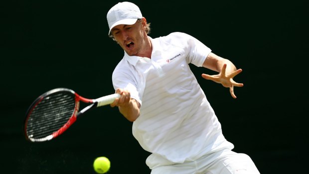 Australia's John Millman toughed it out through a five-set match to reach Wimbledon's second round.