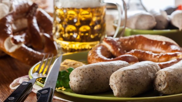 Bavarian breakfast with white sausage, pretzel and beer.