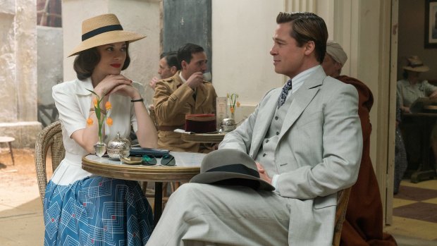 Marion Cotillard, left, and Brad Pitt in a scene from 