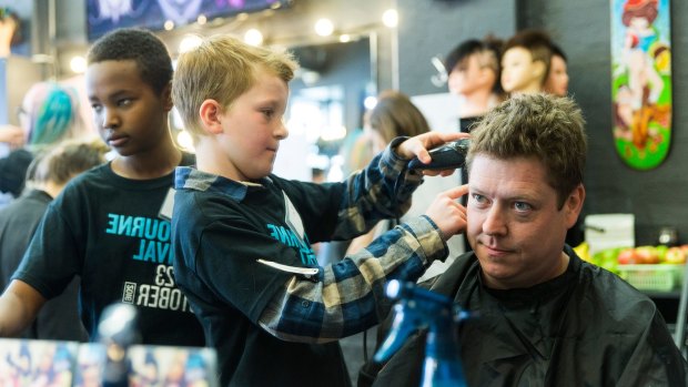 Melbourne Festival artistic director Jonathan Holloway threw himself into participatory events such as <i>Haircuts By Children</i>.