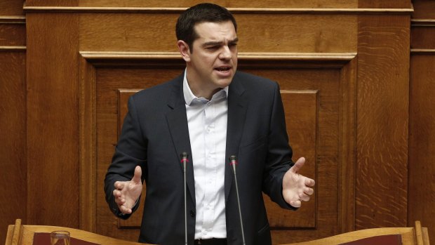 Greek Prime Minister Alexis Tsipras delivers his speech in parliament.