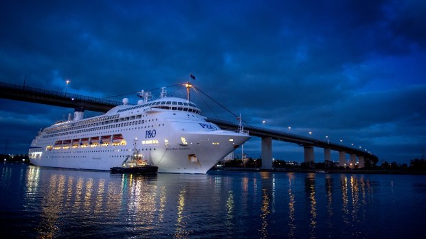 The Pacific Dawn sails under the West Gate Bridge on Melbourne Cup day.