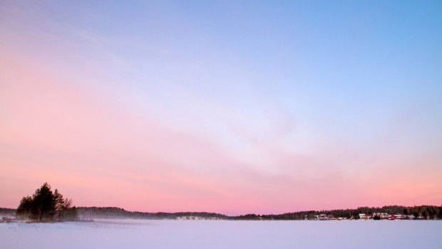 Dawn over Juuma Lake, inside Finland's Oulanka National Park.