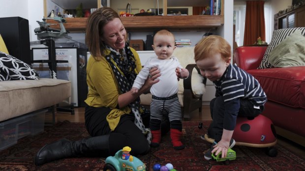 Julia Pickworth with her two boys Reuben Utley, 2, and Ignatius Utley, 6 months at their home in Belconnen.