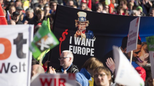 Thousands of protesters demonstrate against the TTIP and CETA trade accords in Berlin.
