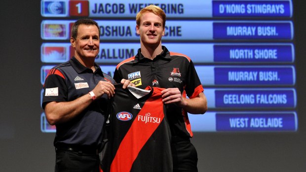 Aaron Francis with Essendon coach John Worsfold in Adelaide on Tuesday night.