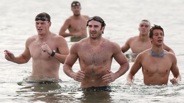 Treading water: Essendon players are in limbo.