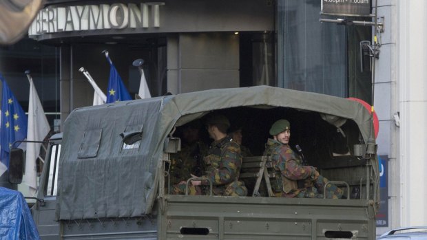 Belgian soldiers outside the headquarters of the European Commission in central Brussels.