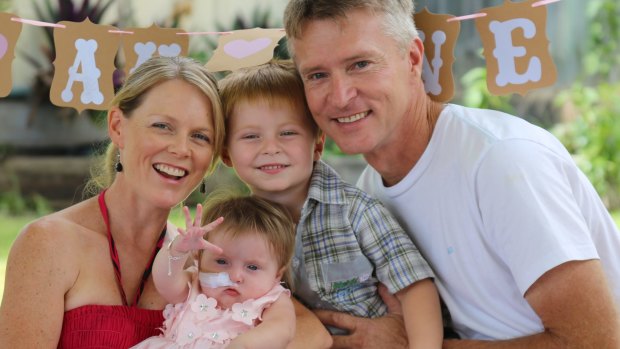 Glenn and Anthea Anderson with children Lucas and Elise. Glenn was told being a live donor to save Elise's life was "elective surgery" and not covered by his income protection insurance.