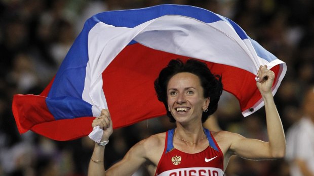 Russia's Mariya Savinova celebrates after winning the Women's 800m final at the World Athletics Championships in South Korea in 2011. WADA has recommended the Russian Athletics Federation be banned for doping offences.