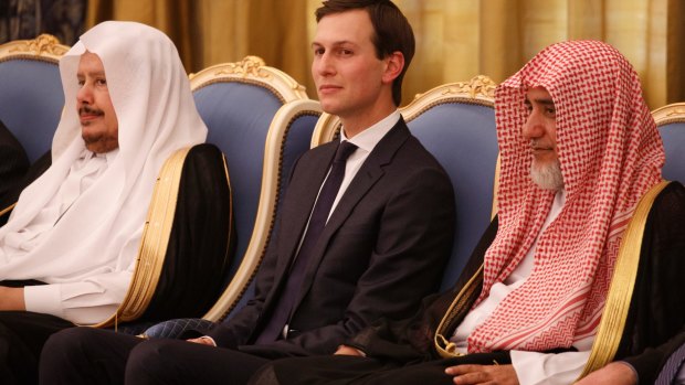 Jared Kushner watches as Donald Trump is presented with The Collar of Abdulaziz Al Saud Medal, at the Royal Court Palace, in Riyadh. 