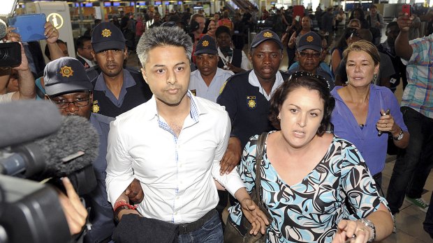 British businessman Shrien Dewani prepares to leave Cape Town airport. 