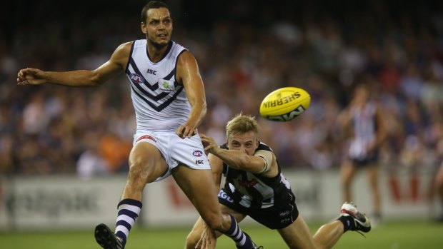 Michael Johnson has extended his contract with Fremantle, tying him to the club until at least 2017.