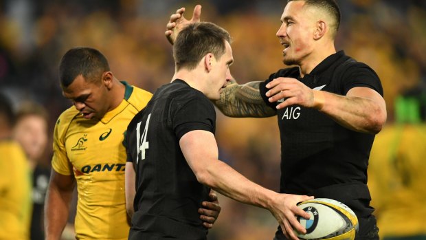 Sonny Bill Williams congratulates Ben Smith after another All Black try.