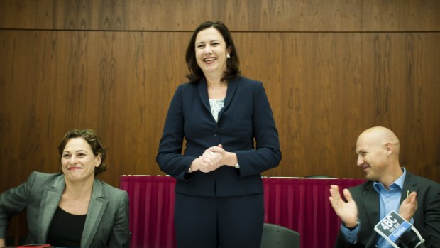 Labor's Caucus welcomes Premier Annastacia Palaszczuk, with Deputy Premier Jackie Trad and Treasurer Curtis Pitt.